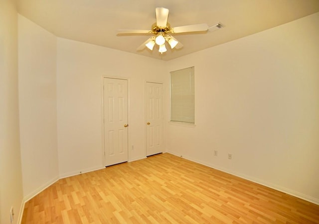14811 Horse Creek Ln, Sugar Land, TX 77498 - spare room featuring light wood finished floors and ceiling fan
