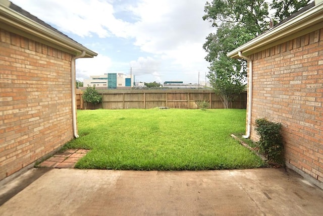 14811 Horse Creek Ln, Sugar Land, TX 77498 - fenced backyard with a patio area