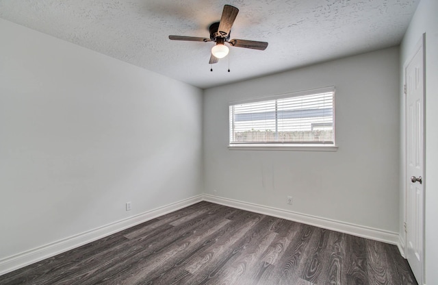 22710 Earlmist Dr, Spring, TX 77373 - spare room featuring dark wood-style flooring, a textured ceiling, and ceiling fan