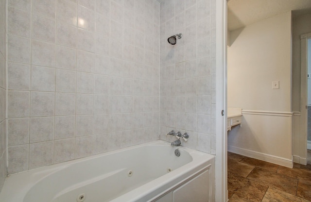 22710 Earlmist Dr, Spring, TX 77373 - full bath with a tub with jets and stone tile floors