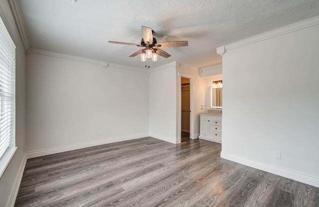 22710 Earlmist Dr, Spring, TX 77373 - unfurnished room with wood finished floors, a ceiling fan, a textured ceiling, and crown molding