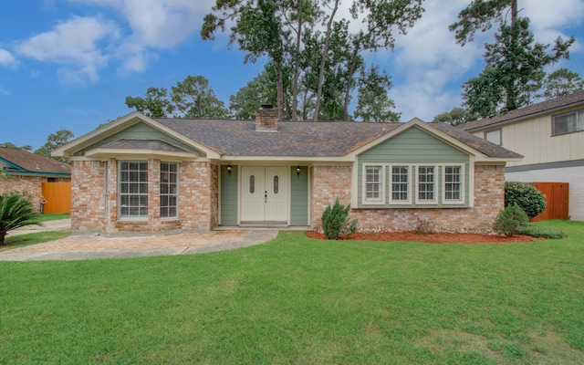 22710 Earlmist Dr, Spring, TX 77373 - ranch-style home with brick siding and a chimney