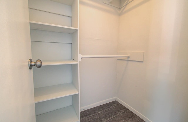 22710 Earlmist Dr, Spring, TX 77373 - walk in closet featuring dark wood-type flooring