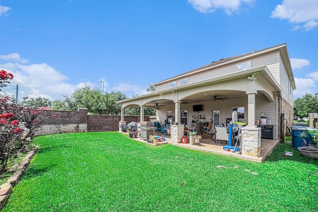 21530 Amesbury Meadow Ln, Spring, TX 77379 - rear view of property featuring ceiling fan and a patio area