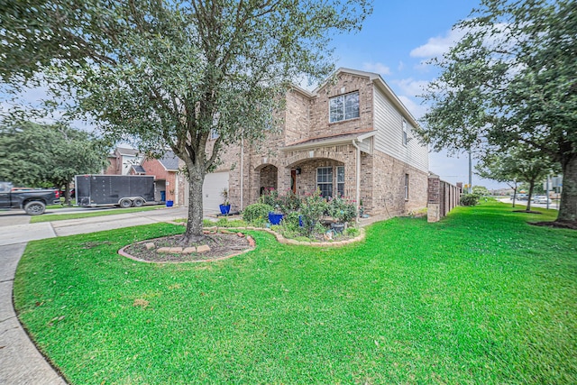 21530 Amesbury Meadow Ln, Spring, TX 77379 - traditional-style house with brick siding, concrete driveway, a front lawn, and a garage