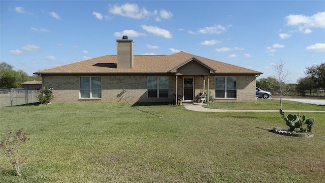 17930 N Interstate 35, West, TX 76691 - back of property with brick siding, a chimney, and roof with shingles