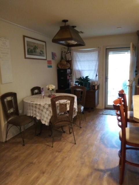 17930 N Interstate 35, West, TX 76691 - dining space with light wood-style floors and crown molding