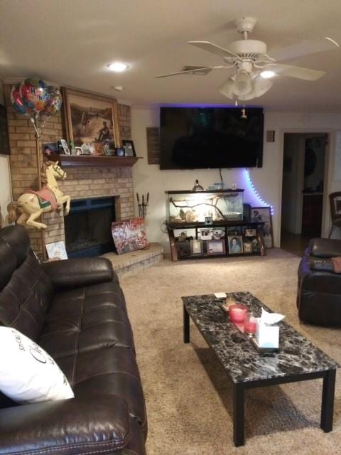 17930 N Interstate 35, West, TX 76691 - living room with carpet flooring, ceiling fan, and a fireplace