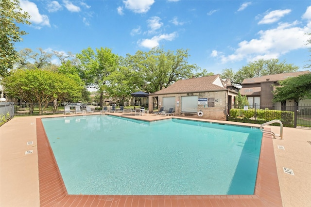 2601 S Braeswood Blvd Unit 302, Houston, TX 77025 - community pool with a patio