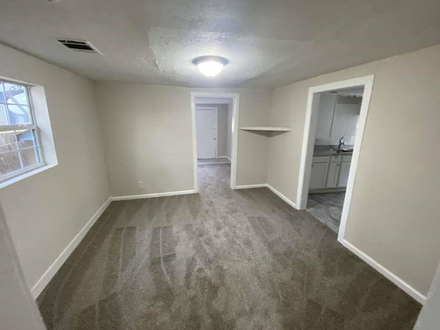 223 Cockerel St, Houston, TX 77018 - carpeted empty room featuring a textured ceiling and baseboards