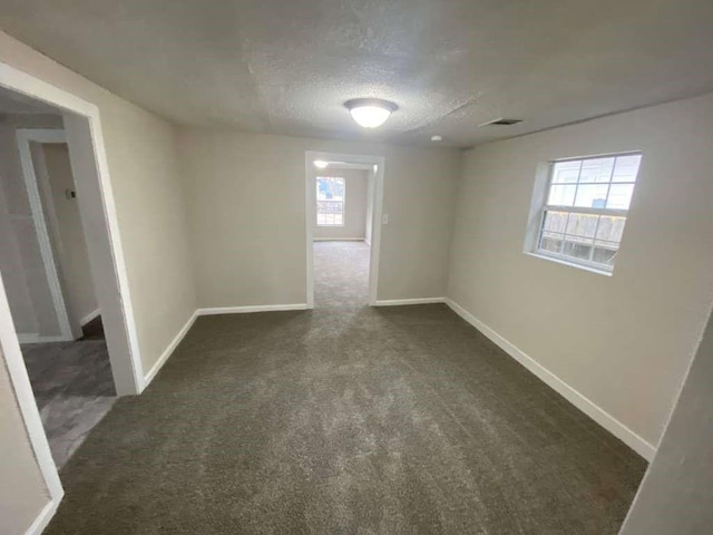 223 Cockerel St, Houston, TX 77018 - carpeted empty room featuring a textured ceiling and baseboards