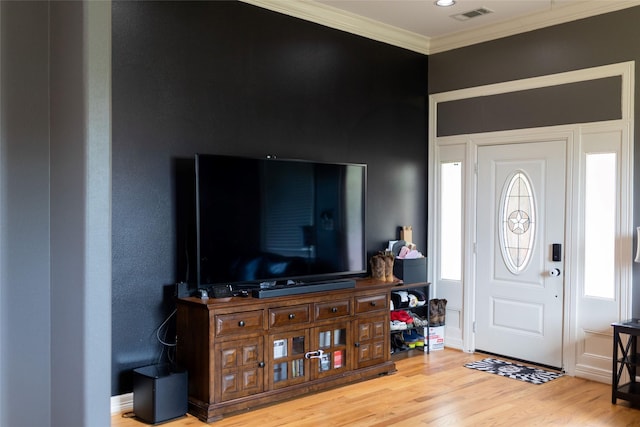 8309 Williamsdell St, Houston, TX 77088 - entryway with crown molding and wood finished floors