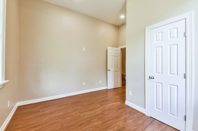 8309 Williamsdell St, Houston, TX 77088 - unfurnished bedroom with light wood-style flooring and recessed lighting
