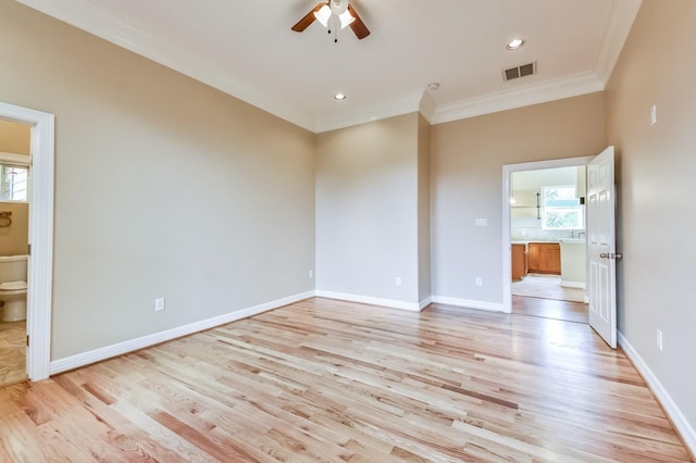 8309 Williamsdell St, Houston, TX 77088 - empty room with a ceiling fan, ornamental molding, light wood-style flooring, plenty of natural light, and recessed lighting
