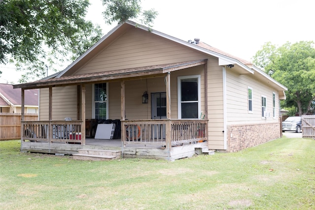 8309 Williamsdell St, Houston, TX 77088 - view of front facade featuring brick siding and a deck