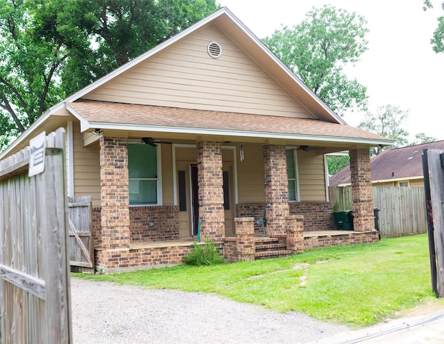 8309 Williamsdell St, Houston, TX 77088 - view of front facade with covered porch, brick siding, and a shingled roof