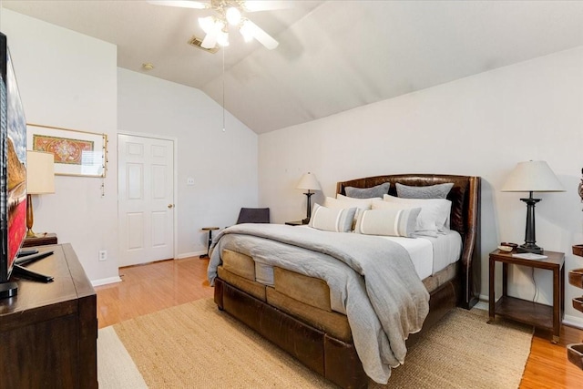 2210 Elm Forest Dr, Pearland, TX 77584 - bedroom with light wood-type flooring, lofted ceiling, and ceiling fan