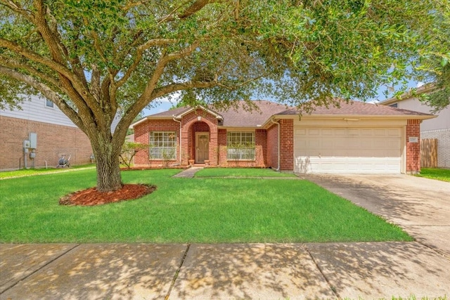 2210 Elm Forest Dr, Pearland, TX 77584 - view of front of house featuring driveway, brick siding, an attached garage, and a front yard