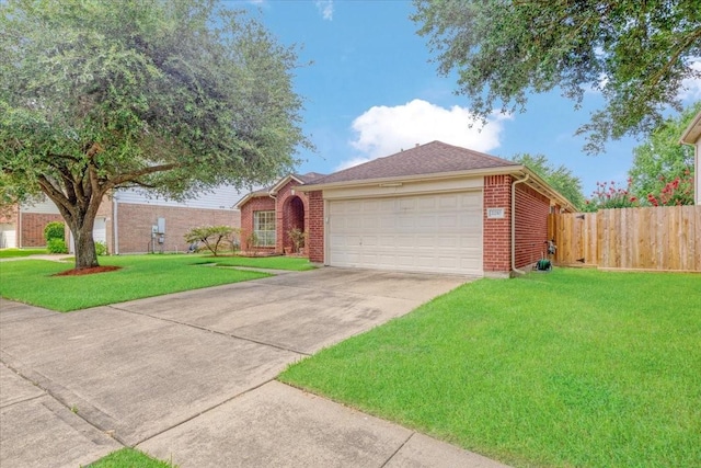 2210 Elm Forest Dr, Pearland, TX 77584 - ranch-style house with brick siding, an attached garage, and concrete driveway