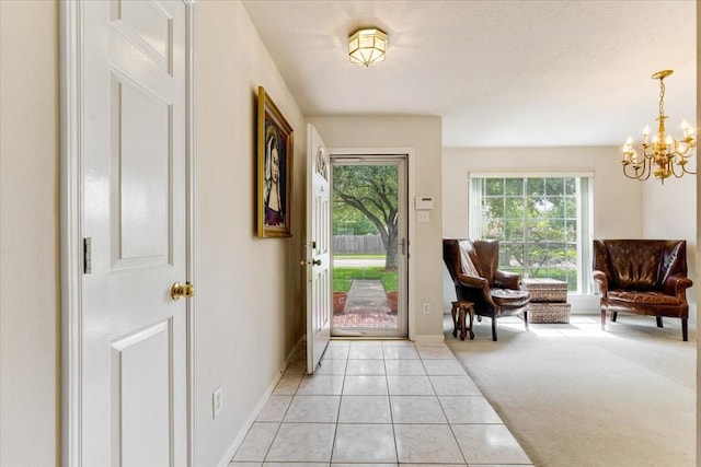 2210 Elm Forest Dr, Pearland, TX 77584 - entrance foyer featuring healthy amount of natural light and a chandelier