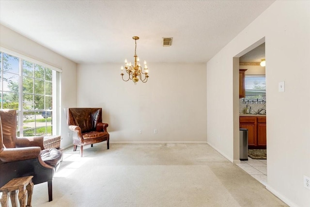 2210 Elm Forest Dr, Pearland, TX 77584 - living area featuring light colored carpet, plenty of natural light, and a chandelier