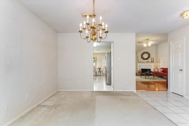 2210 Elm Forest Dr, Pearland, TX 77584 - unfurnished room with a fireplace, a ceiling fan, light tile patterned floors, and a chandelier