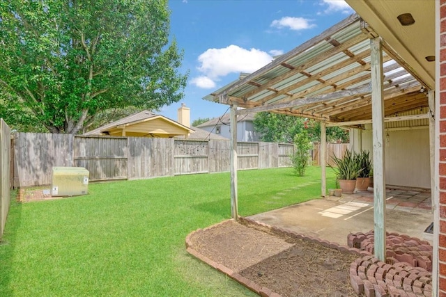 2210 Elm Forest Dr, Pearland, TX 77584 - fenced backyard with a patio area