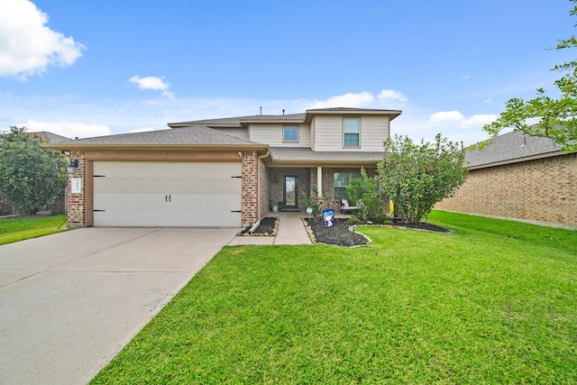 29023 Jacobs River Dr, Katy, TX 77494 - view of front of property with a garage, driveway, a front yard, and brick siding