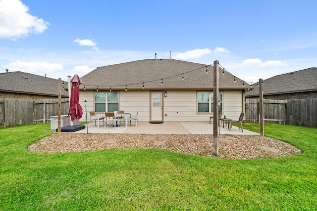 29023 Jacobs River Dr, Katy, TX 77494 - back of property with a patio, a fenced backyard, and roof with shingles