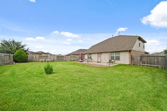 29023 Jacobs River Dr, Katy, TX 77494 - rear view of house featuring a patio area, a fenced backyard, and roof with shingles