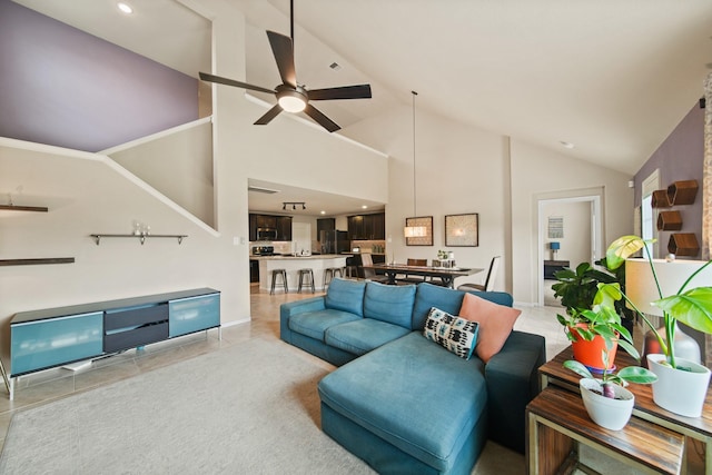 29023 Jacobs River Dr, Katy, TX 77494 - living room with vaulted ceiling, ceiling fan, light tile patterned flooring, and recessed lighting