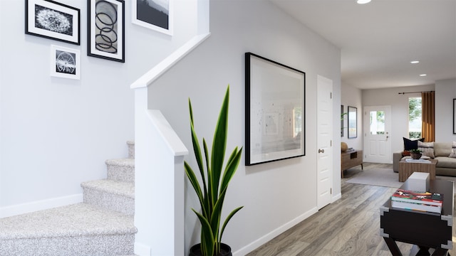 13328 Burbot Dr, Conroe, TX 77384 - stairs featuring wood finished floors and recessed lighting