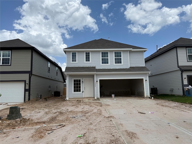 13328 Burbot Dr, Conroe, TX 77384 - view of front of property featuring driveway, a garage, and roof with shingles