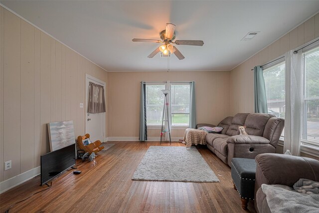 604 Abell St, Wharton, TX 77488 - living room featuring a ceiling fan, wood finished floors, and ornamental molding