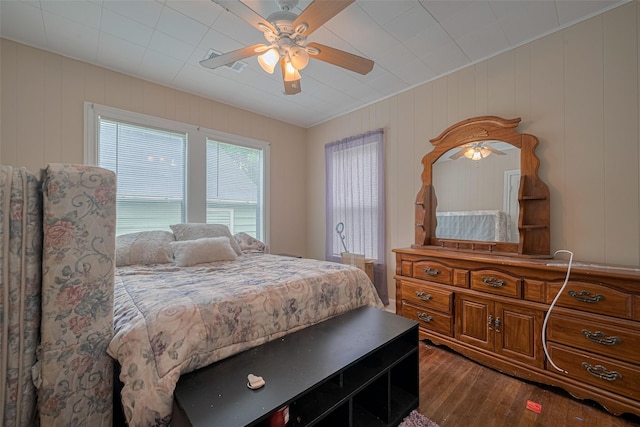 604 Abell St, Wharton, TX 77488 - bedroom with dark wood finished floors and a ceiling fan