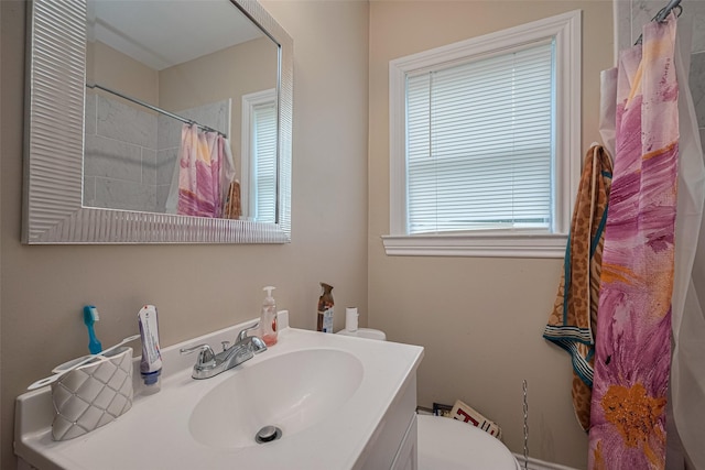 604 Abell St, Wharton, TX 77488 - full bathroom featuring vanity and curtained shower