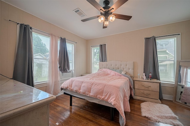 604 Abell St, Wharton, TX 77488 - bedroom featuring dark wood-type flooring and ceiling fan