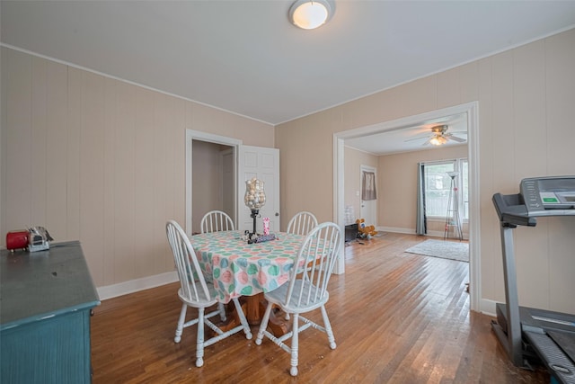 604 Abell St, Wharton, TX 77488 - dining room with wood finished floors, ornamental molding, and ceiling fan