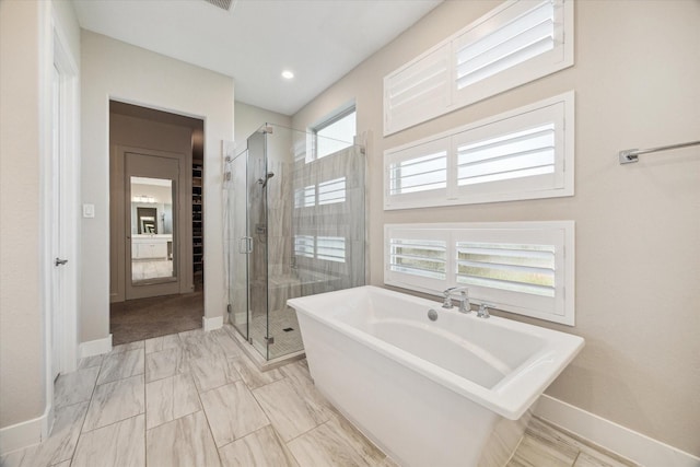 19526 Rock Quillwort Rd, Cypress, TX 77433 - bathroom with a freestanding tub and a shower stall