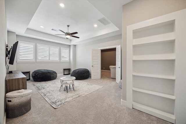 19526 Rock Quillwort Rd, Cypress, TX 77433 - sitting room with ceiling fan, carpet, a raised ceiling, built in shelves, and recessed lighting