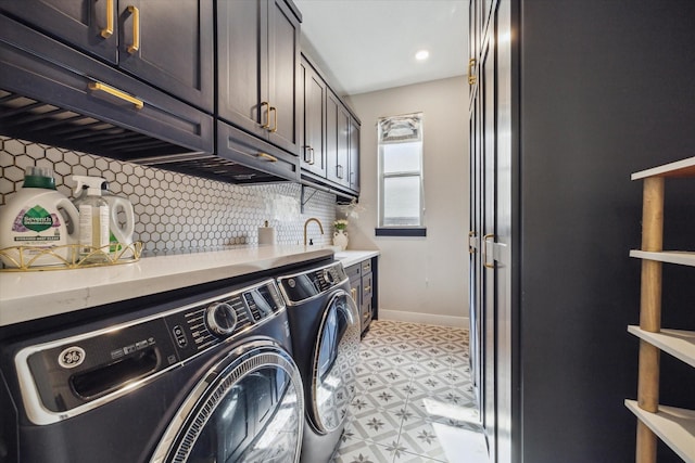 19526 Rock Quillwort Rd, Cypress, TX 77433 - washroom featuring washing machine and dryer, cabinet space, and light flooring