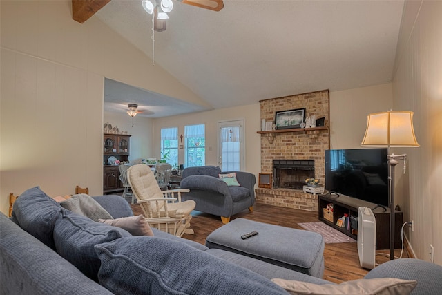 2017 Willow Bend Rd, Wharton, TX 77488 - living room featuring ceiling fan, wood finished floors, a fireplace, beamed ceiling, and high vaulted ceiling