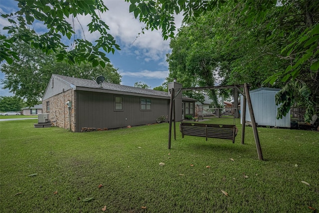 2017 Willow Bend Rd, Wharton, TX 77488 - view of green lawn featuring a storage unit