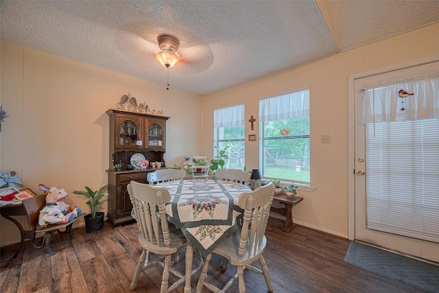 2017 Willow Bend Rd, Wharton, TX 77488 - dining area featuring dark wood-style flooring, a textured ceiling, and ceiling fan