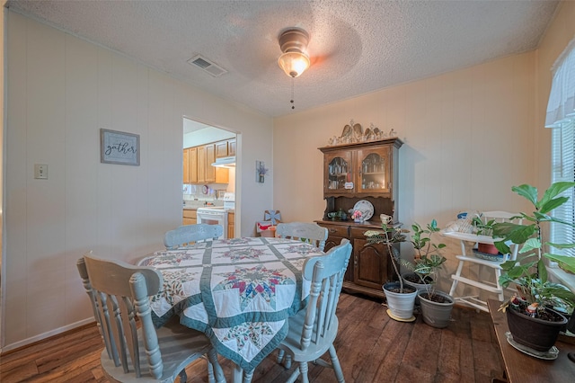 2017 Willow Bend Rd, Wharton, TX 77488 - dining room featuring hardwood / wood-style floors and a textured ceiling