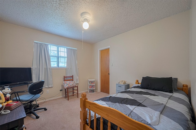 2017 Willow Bend Rd, Wharton, TX 77488 - carpeted bedroom with a textured ceiling and a desk