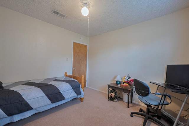 2017 Willow Bend Rd, Wharton, TX 77488 - carpeted bedroom with a textured ceiling and baseboards