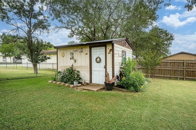 860 Helter St, La Grange, TX 78945 - view of shed with a fenced backyard