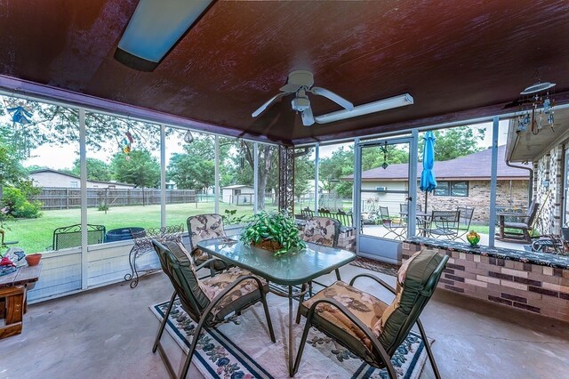 860 Helter St, La Grange, TX 78945 - sunroom / solarium with outdoor dining space, a ceiling fan, and healthy amount of natural light