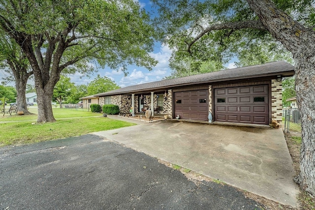 860 Helter St, La Grange, TX 78945 - single story home featuring driveway, a garage, and a shingled roof